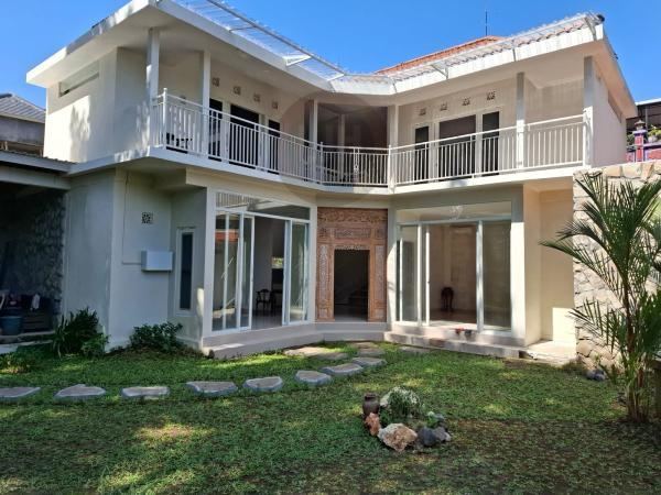 Modern Design 2 Storey House for Sale in Peguyangan, Denpasar. Cool atmosphere like Ubud. Close to Lumintang Park.
