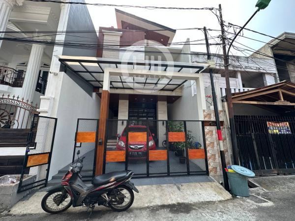 RUMAH MODERN KOMPLEK PONDOK BAMBU
