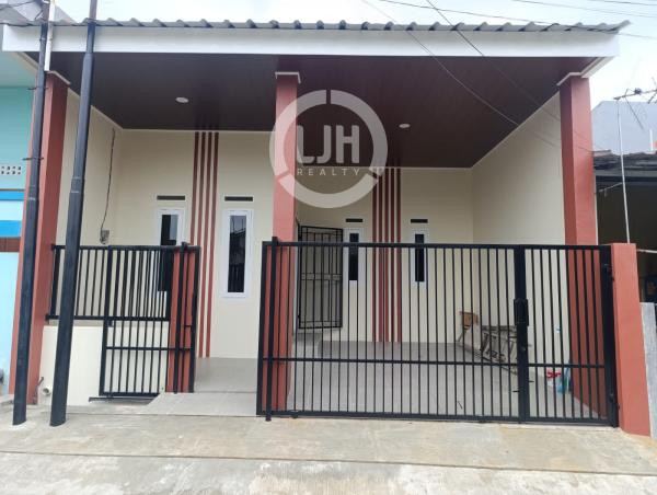 Rumah di Taman Harapan Indah Bekasi Jawa Barat Sudah Tinggi Dari Jalan
