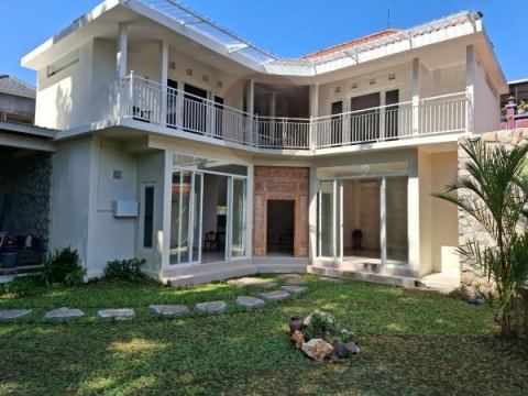 Modern Design 2 Storey House for Sale in Peguyangan, Denpasar. Cool atmosphere like Ubud. Close to Lumintang Park.